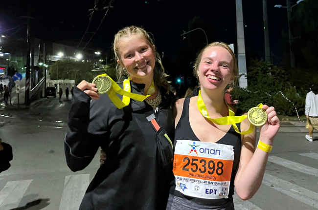 Emma and Anya 10K medals